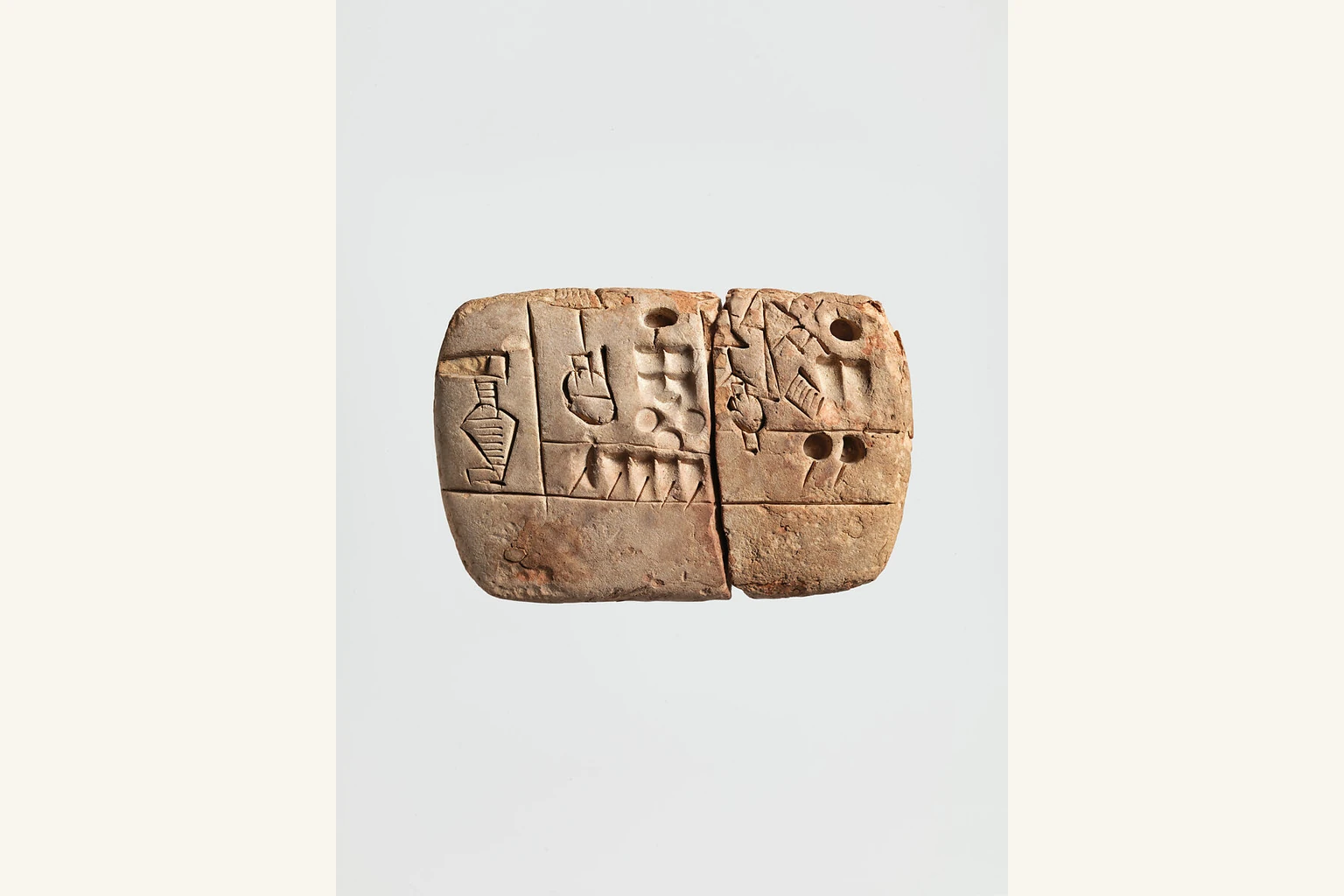 A surviving clay administrative tablet with early written signs, from The Metropolitan Museum of Art collection.